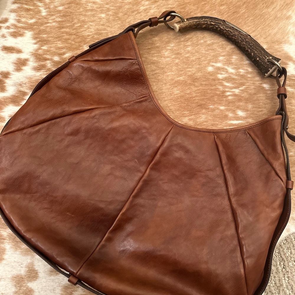Yves Saint Laurent by Tom Ford Mombasa Horn hobo bag.